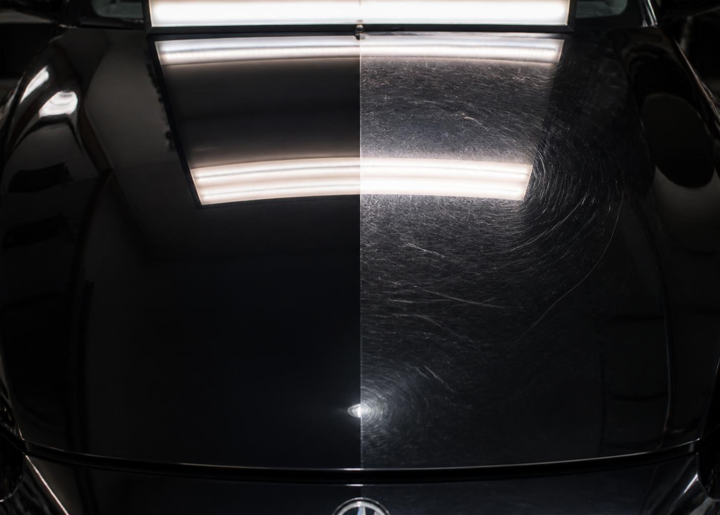 50/50 shot of a bonnet under an inspection light: corrected gloss on the left, untouched swirls on the right